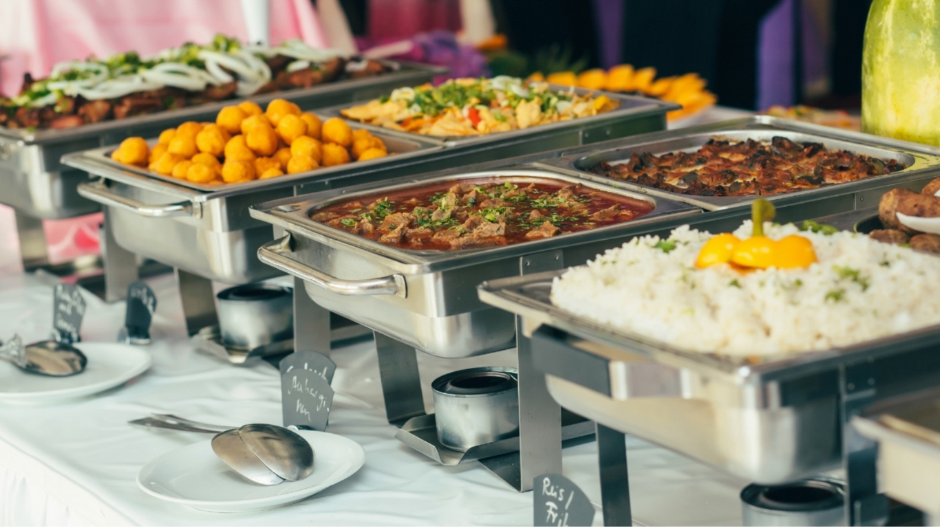 Chef preparing Pakistani dishes with fresh spices