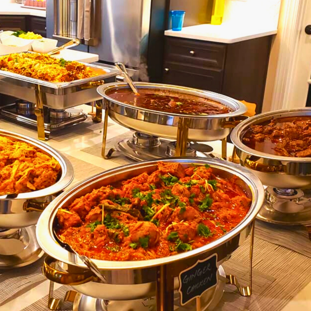 Buffet chafers and trays ready for service at an event